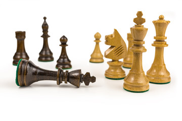 victorious chess king defeating his opponent