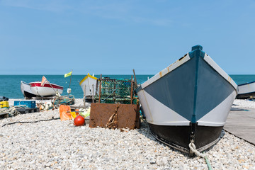 Fototapeta na wymiar Fishing boats with fishing equipment at the beach of Yport in Normandie, France