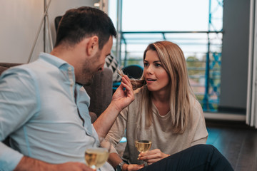 Guy is making fun of girls hair.