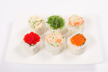 Japanese seafood sushi , six roll on a white background