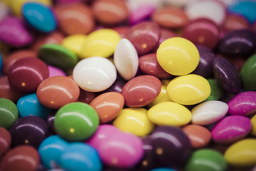Fototapeta na wymiar Background of colorful candy drops.