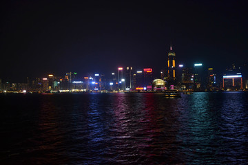 Fototapeta na wymiar The reflection of Hong Kong's skyline at night