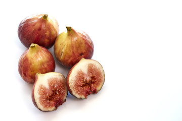 Ripe sweet figs isolated on white