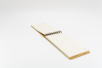 Naklejka premium An opened blank notebook isolated on white background.