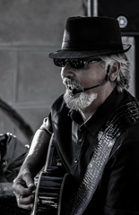 Guitarist and singer. B&W photo