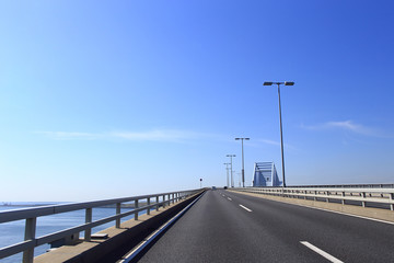 Car driving on the Tokyo Gate Bridge