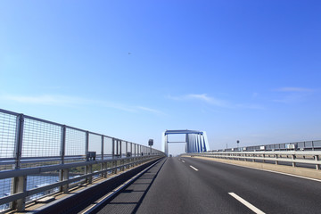 Car driving on the Tokyo Gate Bridge