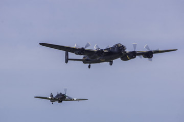 Fototapeta na wymiar Avro Lancaster B1 with a Hawker Hurricane11c