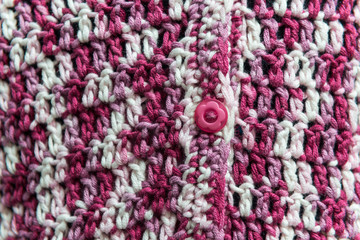 Close-up detail of wool knitted crochet cardigan 