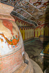 Old murals inside the caves of the Buddhist temple and monastery Mulkirigala Raja Maha Vihara. The...