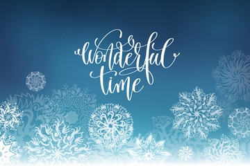 wonderful time hand lettering inscription on snowflakes