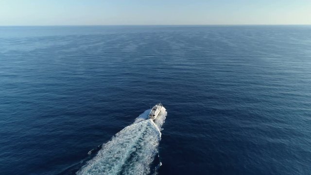 Overhead shot of luxury boat on open ocean