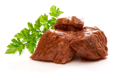 Stew Meat with herbs isolated on white background