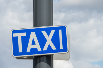 Blue taxi rank sign