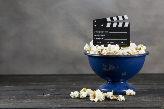 Movie Clapper Board and Popcorn