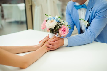 Wedding details of the bride and groom, hugs