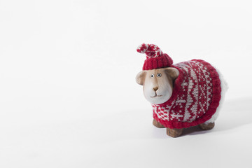 cow doll in red pullover isolated on a white background.