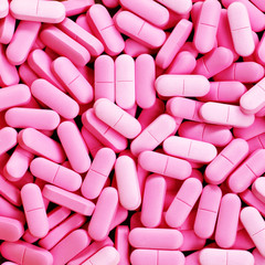A lot of pink medicine pills