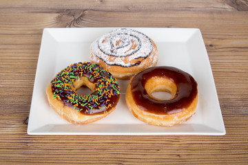 Yummy Donut on Wooden Background