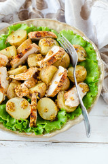Warm salad of chicken and potatoes with mustard dressing