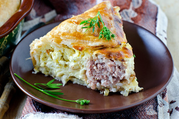 Pie with meat and cheese