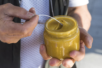 Small spoon in royal jelly