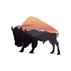 Plakat Silhouette of buffalo with panorama of mountains.