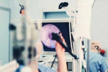 endoscopy examination procedure with endoscope equipment in surgical room endoscopic exam with...