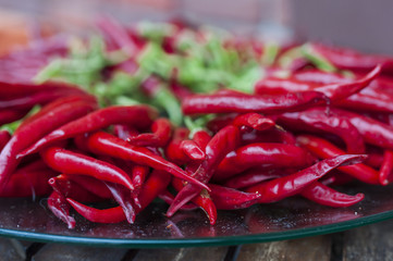 Chilli pepper on wooden background