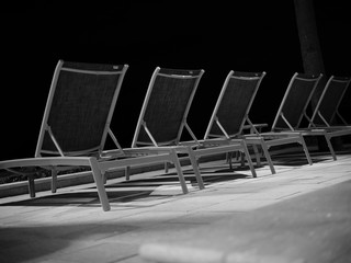 lounge chairs at night