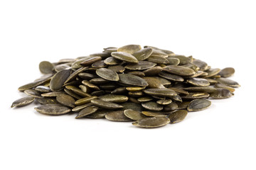 Pumpkin seeds on a white background
