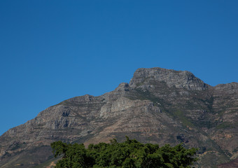 Fototapeta premium Landscape of Cape Town with seldom view of the Table Mountain without clouds in South Africa