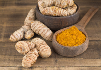 Roots and turmeric powder - Curcuma longa