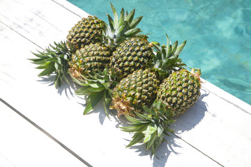 Pineapple - summer holidays, vacation and food concept