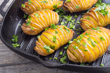 Freshly baked hasselback potatoes