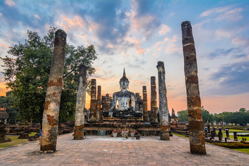 Fototapeta na wymiar Sitting Budha in Wat Mahathat, historical park which covers the ruins of the old city of Sukhothai, Thailand