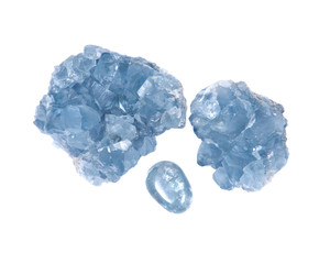 Blue celestite cluster and polished celestite palm stone isolated on white background