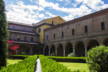Inside the cloister of the Basilica di San Domenico in Bologna