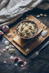 Fresh delicious mediterranean national traditional seafood dish pilaw with rice and mussels