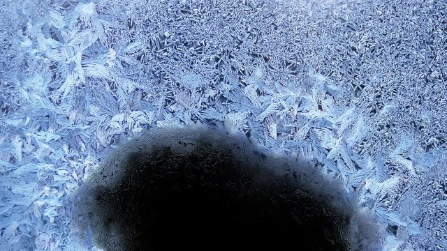 Beautiful frozen window melting animation from bottom to top, timelapse defrost transition, natural dissolve, isolated on black background with black and white luminance matte, alpha channel.