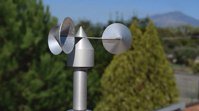 close up of aluminum anemometer on roof