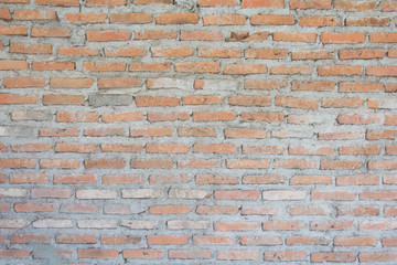 Obraz premium red brick wall texture grunge background with vignetted corners