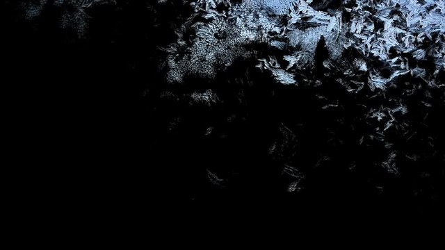 Beautiful window freezing animation from top to bottom, timelapse frost forming transition, natural crystal icing, isolated on black background with black and white luminance matte, alpha channel.