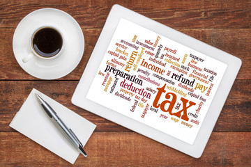 tax  word cloud  on tablet