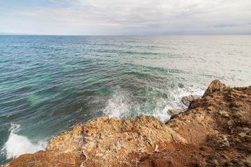 Waves crashing to rock at Manzanillo Costa Rica