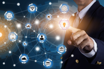 Business man working with modern virtual technology and pressing a button on the touch screen. futuristic technology concept.