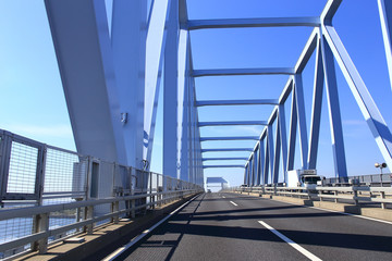 Car driving on the Tokyo Gate Bridge