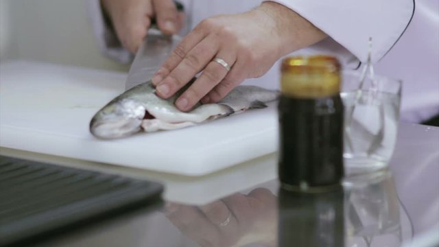 closeup of food preparation  cheff hands while in kithcen