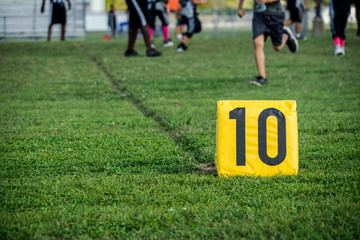 10 yard marker at a youth football game 