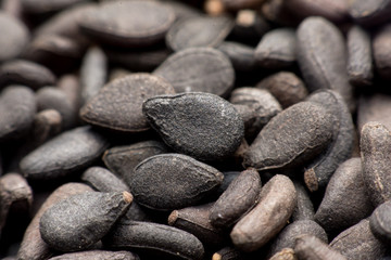 Close up Pile of black sesame seeds background